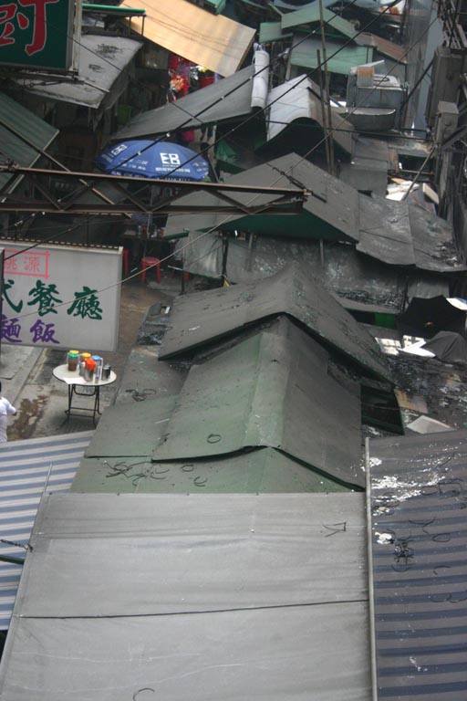 Close up of open air market tin roofs