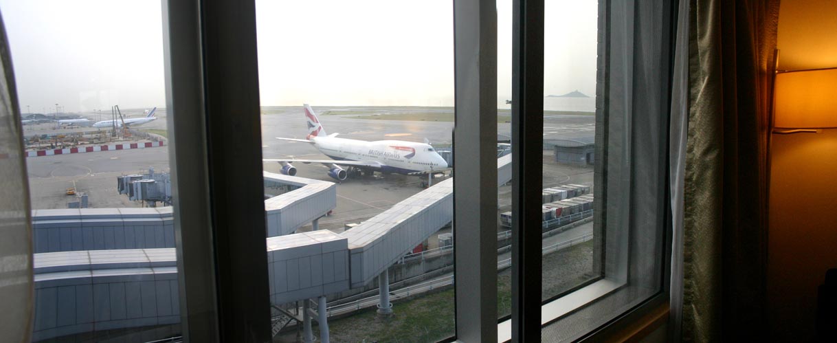 Room view of airport apron and runway.